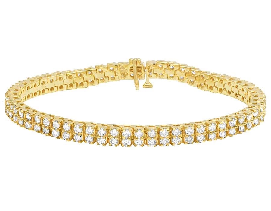 10K YELLOW GOLD DIAMOND 2 ROW TENNIS BRACELET: 10K Yellow Gold Diamond 2 Row Tennis Bracelet Brand: None Type: Bracelet Material: 10K Yellow Gold, Main Stone/Creation Natural Color: Yellow Gold Size: Dimension 8", 6mm Accessories: None