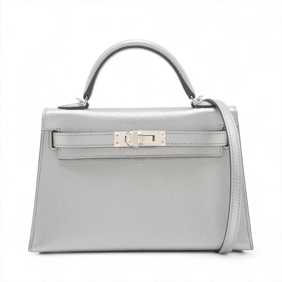 HERMES MINI KELLY 2 20 CHÈVRE SHAMUKIRA ARGENT SILVER: Hermes mini kelly 2 20 Chèvre Shamukira Argent Silver Brand: Hermès Type: Hand bag Material: Chèvre Shamukira Color: Argent Size: Height:4.7inch Length:7.5inch Depth:2.2inch Handle height:2.0inch