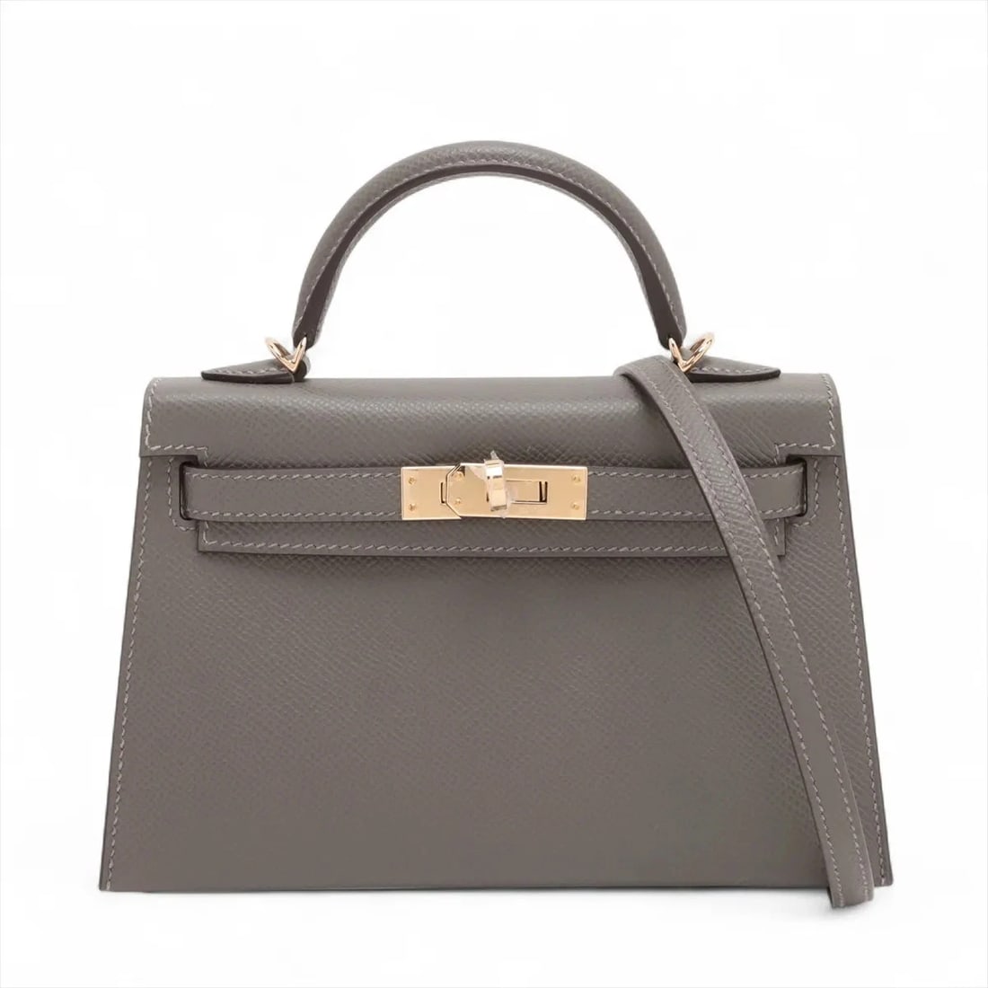 HERMES MINI KELLY 2 20 SERIE VERSO VEAU EPSOM: Hermes mini kelly 2 20 Serie Verso Veau Epsom Brand: Hermès Type: Hand bag Material: Veau Epsom Color: Grimeyer x Nata Size: Height:4.5inch Length:7.5inch Depth:2.2inch Handle height:2.0inch
