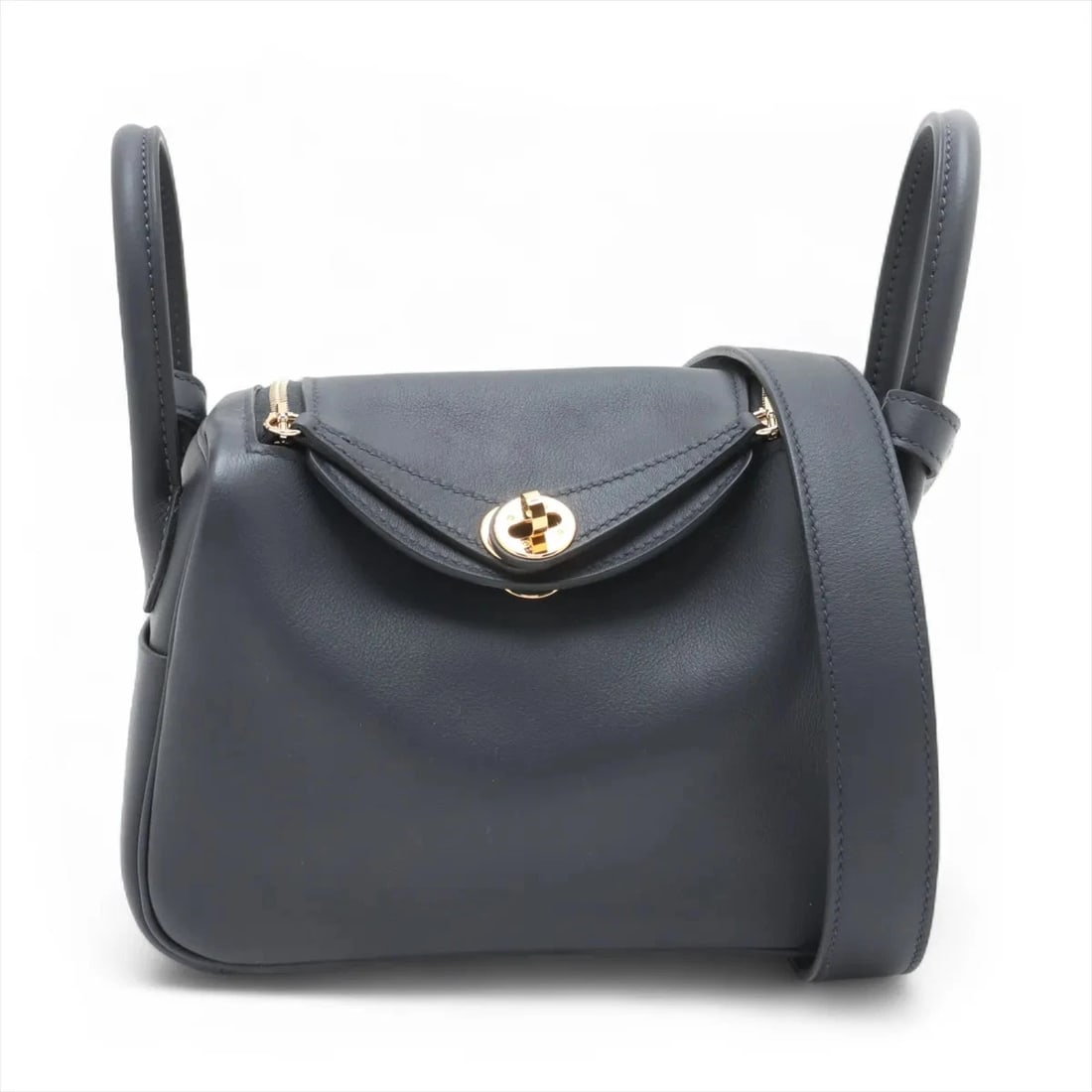 HERMES LINDY MINI 20 VERSO VEAU SWIFT CAVAN X BLUE: Hermes Lindy mini 20 Verso Veau Swift Cavan x Blue Brand: Hermès Type: Shoulder bag Material: Veau Swift Color: Caban x Blue Frida Size: Height:4.7inchLength:7.3inchDepth:3.7inch Accessories: None