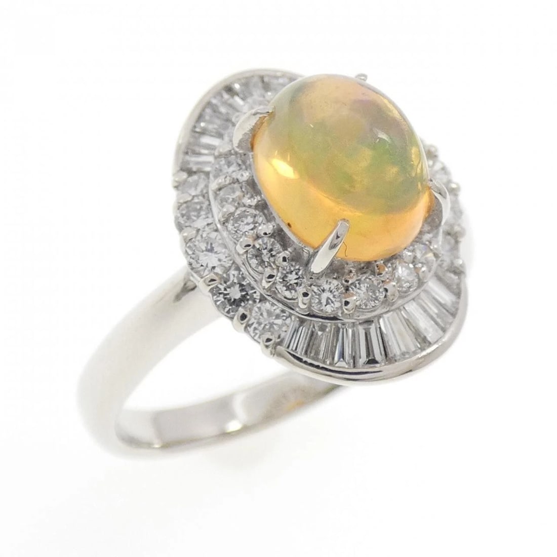 PT900 OPAL RING: PT900 Opal Ring Brand: Unbranded Type: Opal Ring Material: PT900, Main Stone/Creation OpalSecondary Stone Diamond Color: Silver Size: US7 3/4 Accessories: None Accessories Notice: When purchasing