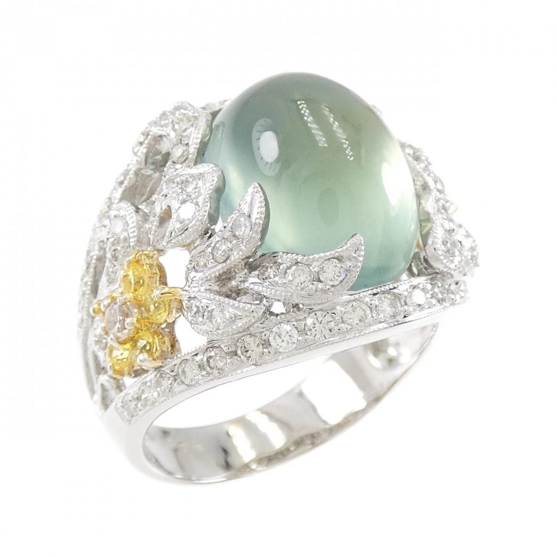 K18WG PLAYNITE RING: K18WG Playnite Ring Brand: Unbranded Type: Prehnite Ring Material: K18WG, Main Stone/Creation play night Secondary Stone Beryl/Sapphire/Diamond Color: White gold Size: US6 3/4 Accessories: None