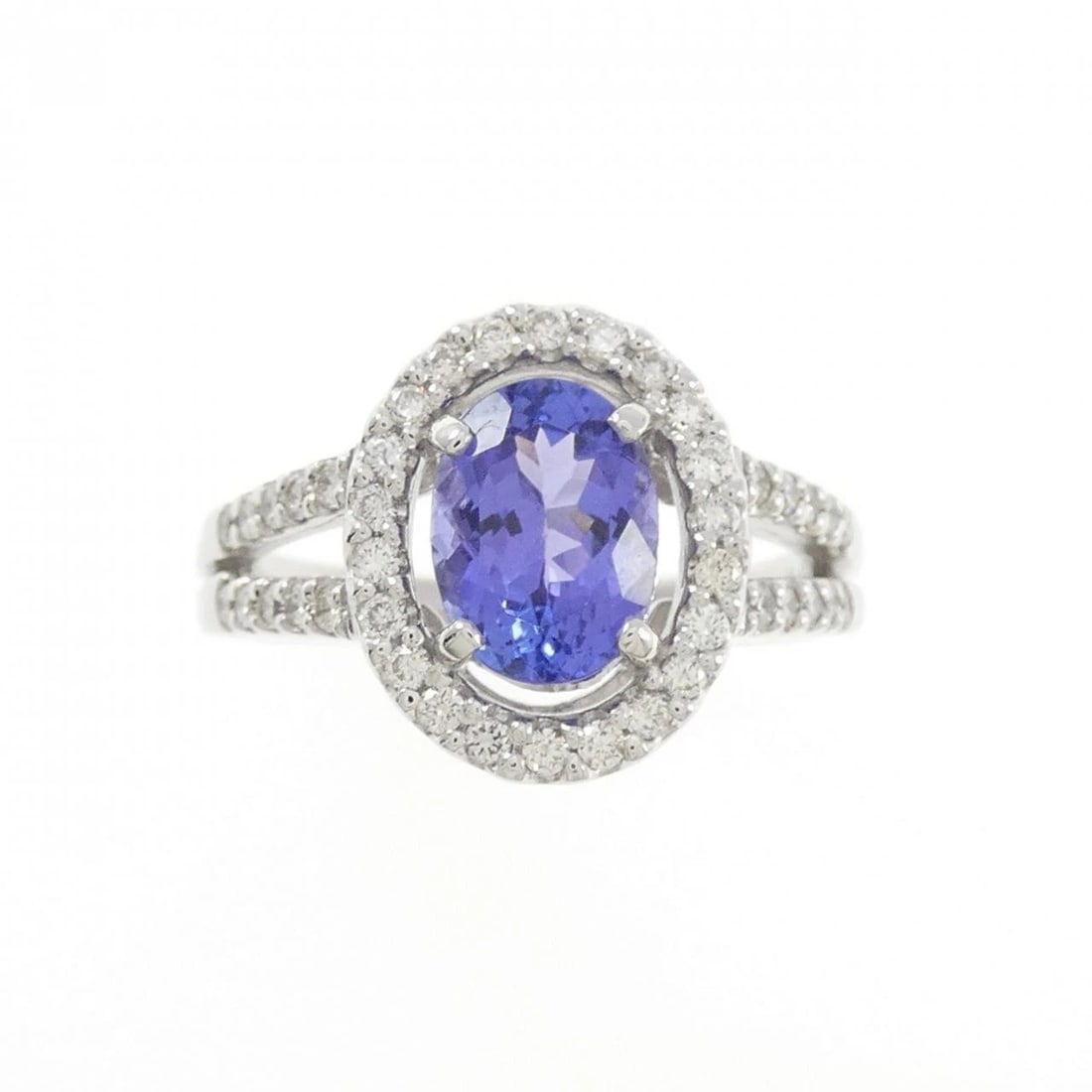 K18WG TANZANITE RING: K18WG Tanzanite Ring Brand: Unbranded Type: Tanzanite Ring Material: K18WG, Main Stone/Creation Tanzanite Secondary Stone Diamond Color: White Gold Size: US5 3/4 Accessories: None Accessor