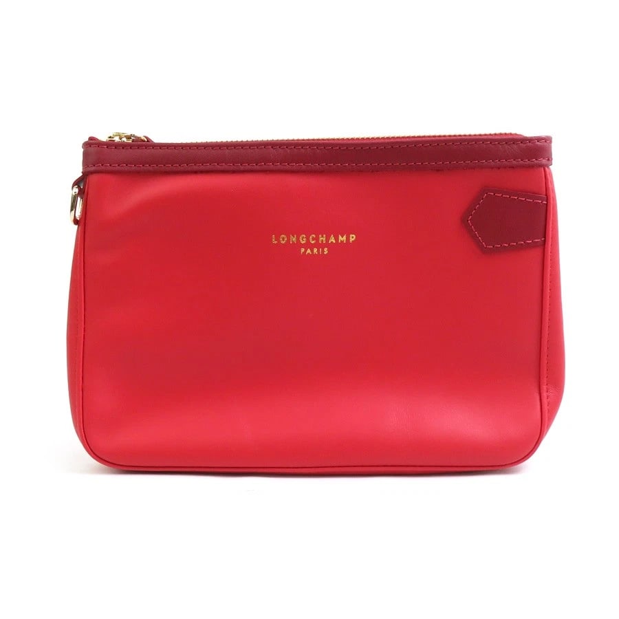 LONGCHAMP POUCH RED LEATHER: Longchamp Pouch Red Leather Brand: Longchamp Type: Pouch Material: Leather Color: Red Size: W:8.1inx H:5.7inx D:1.4in Accessories: None Accessories Notice: When purchasing pre-owned goods, please