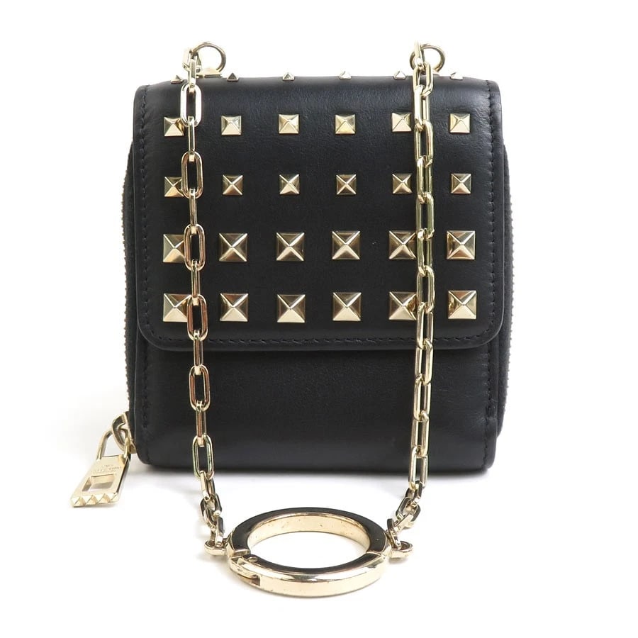 VALENTINO GARAVANI COIN PURSE CASE COMPACT WALLET: Valentino Garavani Coin Purse Case Compact Wallet Brand: Valentino Garavani Type: Coin case Material: Leather Color: Black Size: W:3.7inx H:3.9inx D:0.8in Accessories: None Accessories Not