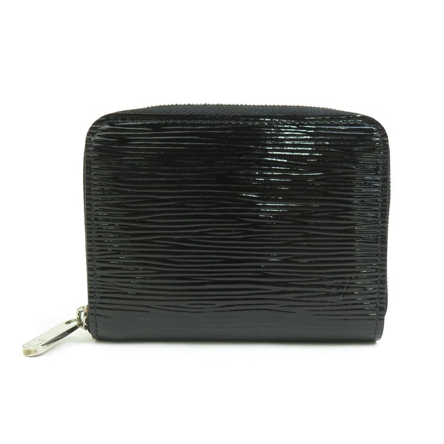 LOUIS VUITTON EPI ELECTRIC ZIPPY COIN PURSE: LOUIS VUITTON Epi Electric Zippy Coin Purse Brand: LOUIS VUITTON Type: Coin case Material: Epi Leather Color: Noir Size: W:4.3inx H:3.3inx D:0.8in Accessories: None Accessories Notice: Whe