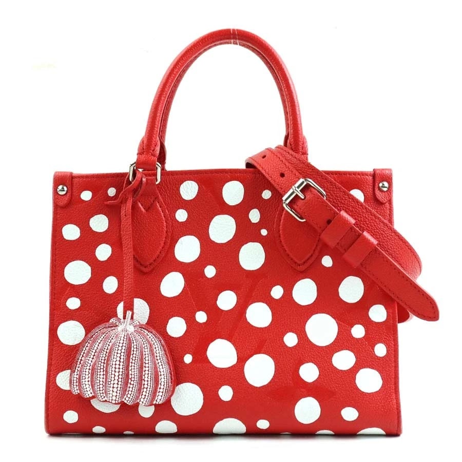 LOUIS VUITTON LV X YK ON THE GO PM HANDBAG: LOUIS VUITTON LV x YK On The Go PM Handbag Brand: LOUIS VUITTON Type: Handbag Material: Monogram Empreinte Leather Color: Rouge Bron Size: W:9.6inx H:7.1inx D:3.9in Handle Length:11.4in Accessorie