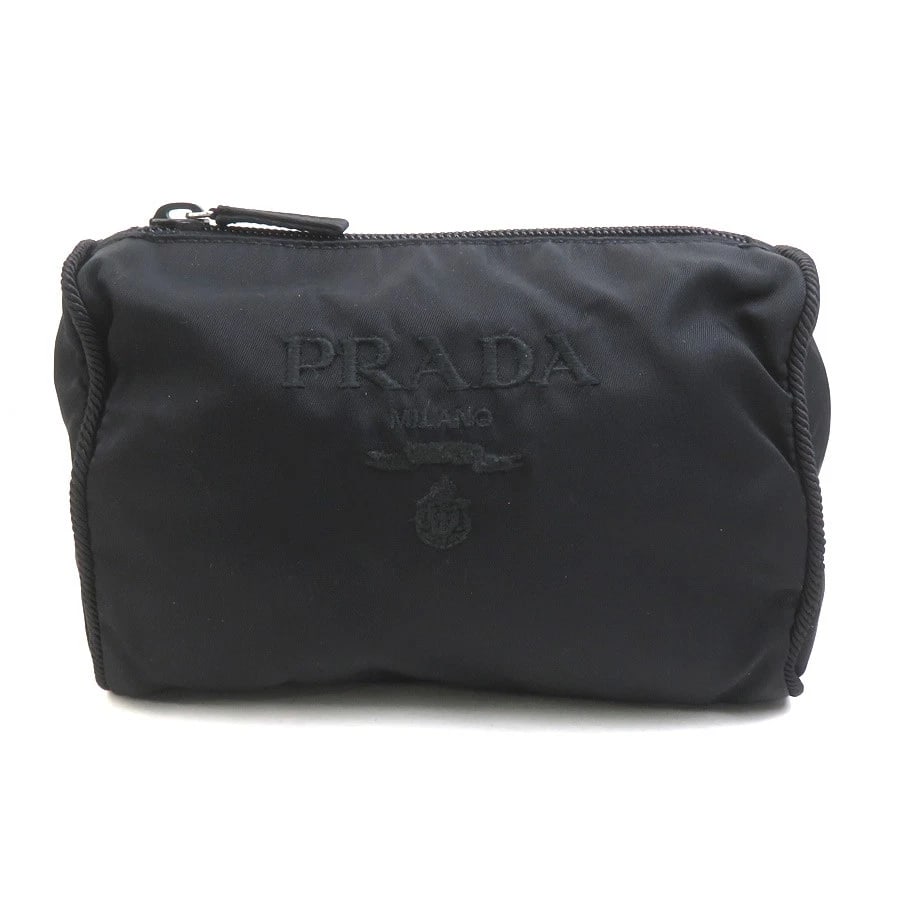 PRADA POUCH BLACK NYLON: PRADA Pouch Black Nylon Brand: PRADA Type: Pouch Material: Nylon Color: Black Size: W:6.9inx H:4.3inx D:2.2in Accessories: None Accessories Notice: When purchasing pre-owned goods, please