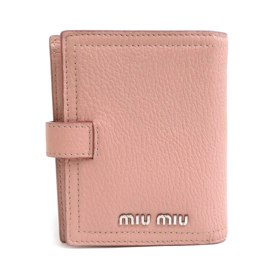 MIUMIU BIFOLD WALLET PINK LEATHER/SILVERTONE: MIUMIU Bifold Wallet Pink Leather/Silvertone Brand: MIUMIU Type: Bifold Wallet Material: Leather Color: Pink Size: W:4.3inx H:3.5inx D:0.8in Accessories: None Accessories Notice: When purchasing