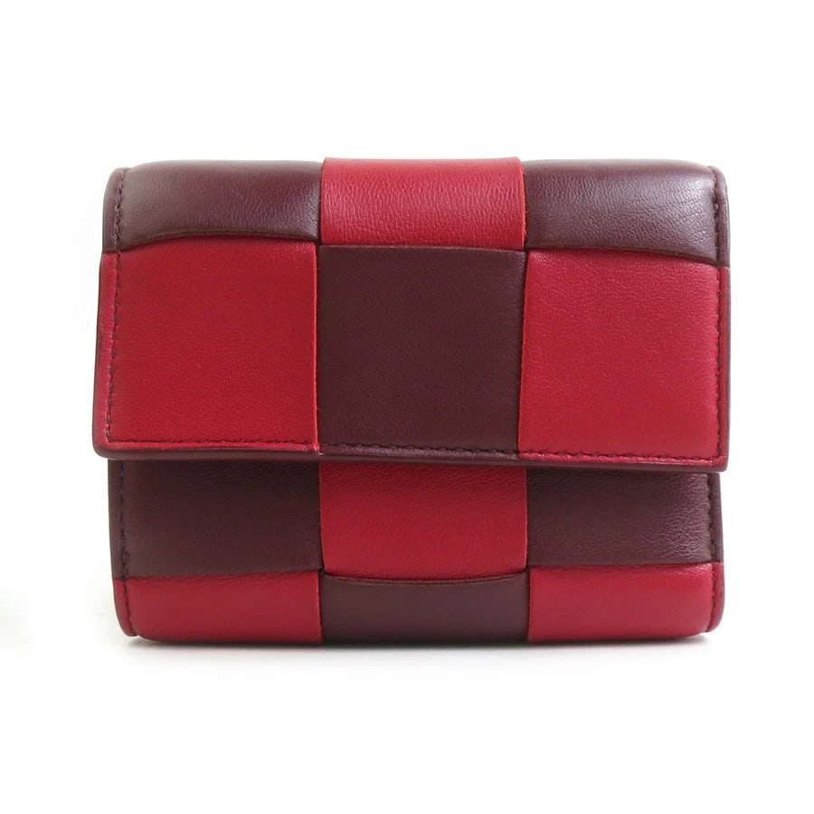 BOTTEGAVENETA TRIFOLD WALLET LEATHER: BOTTEGAVENETA Trifold Wallet Leather Brand: BOTTEGAVENETA Type: Tri-fold wallet Material: leather Color: Red X Bordeaux Size: W:4.5inx H:3.5inx D:1.2in Accessories: None Accessories Notice