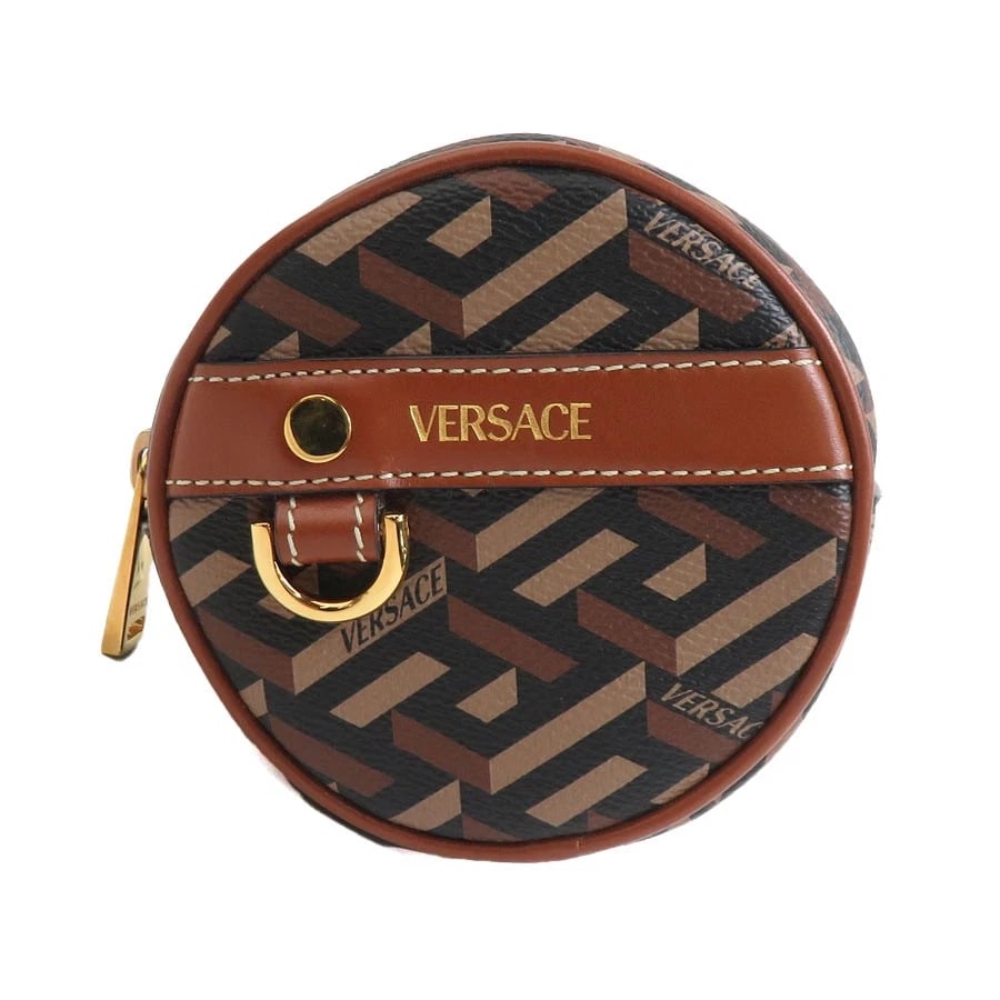 VERSACE POUCH BROWN PVC/LEATHER/GOLDTONE: VERSACE Pouch Brown PVC/Leather/Goldtone Brand: VERSACE Type: Pouch Material: PVC Coated Canvas/Leather Color: Brown Size: W:4.3inx H:4.3inx D:1.8in Accessories: None Accessories Notice: W