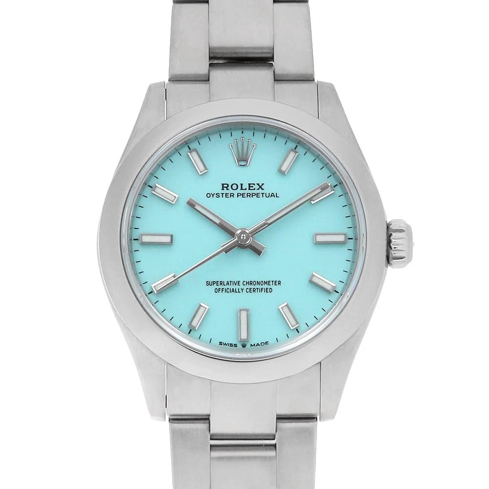ROLEX OYSTER PERPETUAL TURQUOISE BLUE WATCH: ROLEX Oyster Perpetual turquoise blue Watch Brand: ROLEX Type: Wrist watch Material: Band Material Stainless Steel, Case Material Stainless Steel Color: Dial Colour Turquoise Blue Size: Case:W31mm Cir