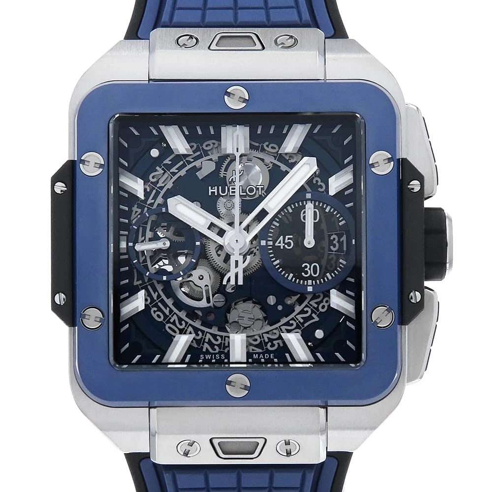 HUBLOT UNICO SQUARE BANGS TITANIUM AND BLUE CERAMIC WATCH: HUBLOT Unico Square Bangs Titanium and Blue Ceramic Watch Brand: HUBLOT Type: Wrist watch Material: Band Material rubber, Case Material titanium/ceramic Color: Dial Colour Skeleton Size: Case:W42mm