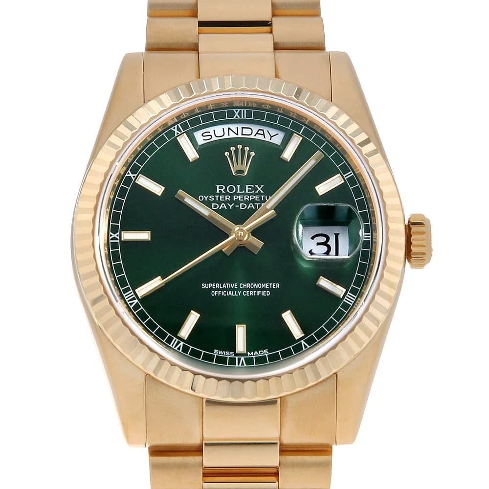 ROLEX DAY DATE GREEN WATCH: ROLEX Day date green Watch Brand: ROLEX Type: Wrist watch Material: Band Material Yellow Gold, Case Material Yellow Gold Color: Dial Colour Green Size: Case:W36mm Circumference of Wrist:17.5cm