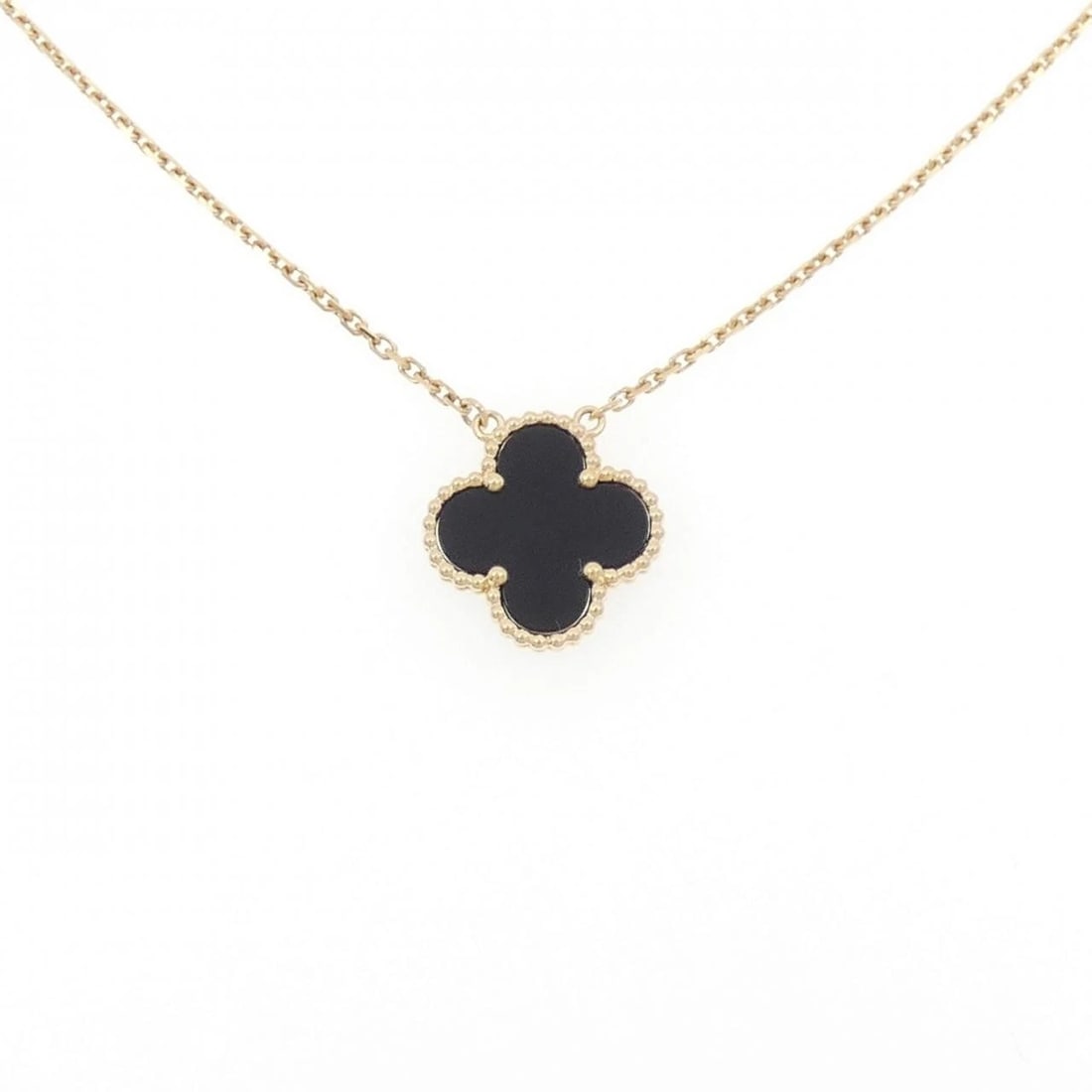 VAN CLEEF & ARPELS ALHAMBRA NECKLACE: Van Cleef & Arpels Alhambra Necklace Brand: Van Cleef & Arpels Type: Van Cleef & Arpels Necklace Material: 750 yellow gold, Main Stone/Creation Onyx Color: yellow gold Size: Actual Size Pendant