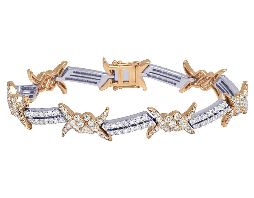 THORN BARBED WIRE DIAMOND DESIGNER BRACELET: Thorn Barbed Wire Diamond Designer Bracelet Brand: None Type: Bracelet Material: 14K Rose-White Gold, Main Stone/Creation Natural Color: Rose-White Gold Size: Dimension 8.25" x 12mm Accessories: N