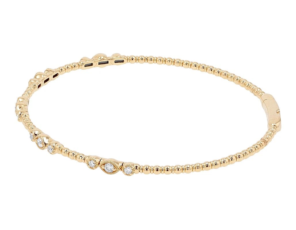 14K YELLOW GOLD BEADED DIAMOND ACCENT BANGLE BRACELET: 14K Yellow Gold Beaded Diamond Accent Bangle Bracelet Brand: None Type: Bracelet Material: 14K Yellow Gold, Main Stone/Creation Natural Color: Yellow Gold Size: Dimension Length 6.5", Width 3MM Ac
