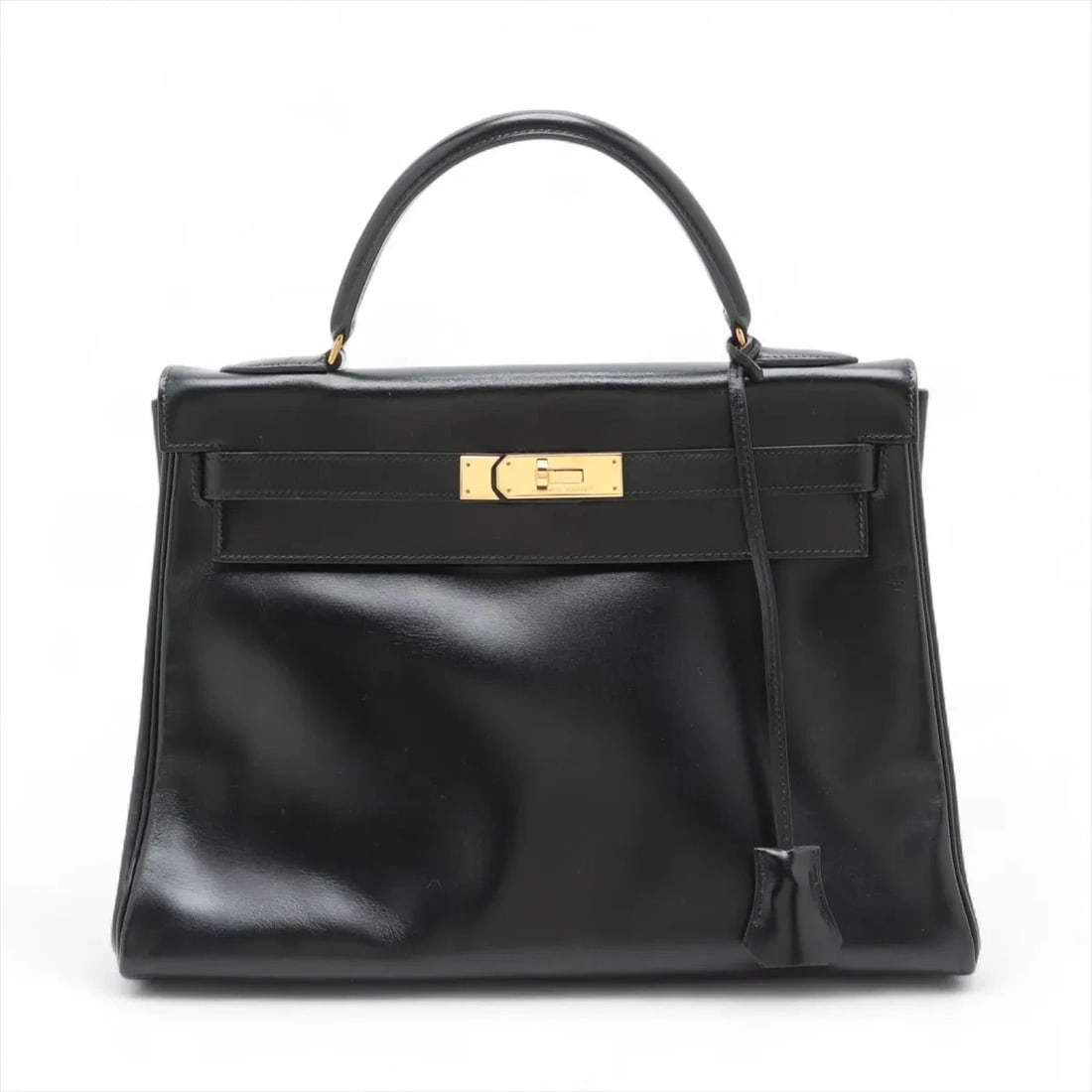 HERMES KELLY 32 LE TOURNAY BOX CALF BLACK GOLD: Hermes Kelly 32 Le Tournay Box calf Black Gold Brand: Hermès Type: Hand bag Material: Box calf Color: Black Size: Height:8.7inch Length:12.6inch Depth:4.7inch Handle height:3.5inch Accessories: No