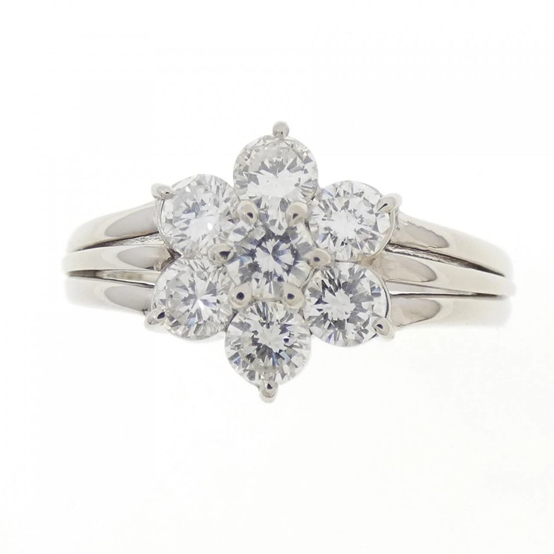 PT900 FLOWER DIAMOND RING: PT900 Flower Diamond Ring Brand: Unbranded Type: Diamond Ring Material: PT900, Main Stone/Creation Natural Color: Silver Size: US6 Accessories: None Accessories Notice: When purchasing pre