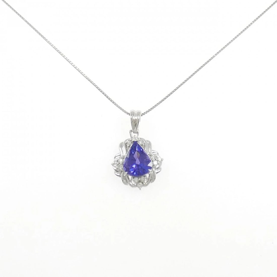 PT900/PT850 TANZANITE NECKLACE: PT900/PT850 Tanzanite Necklace Brand: Unbranded Type: Tanzanite Necklace Material: PT900/PT850, Main Stone/Creation Tanzanite Secondary Stone Diamond Color: Silver Size: Actual Size Pendant length