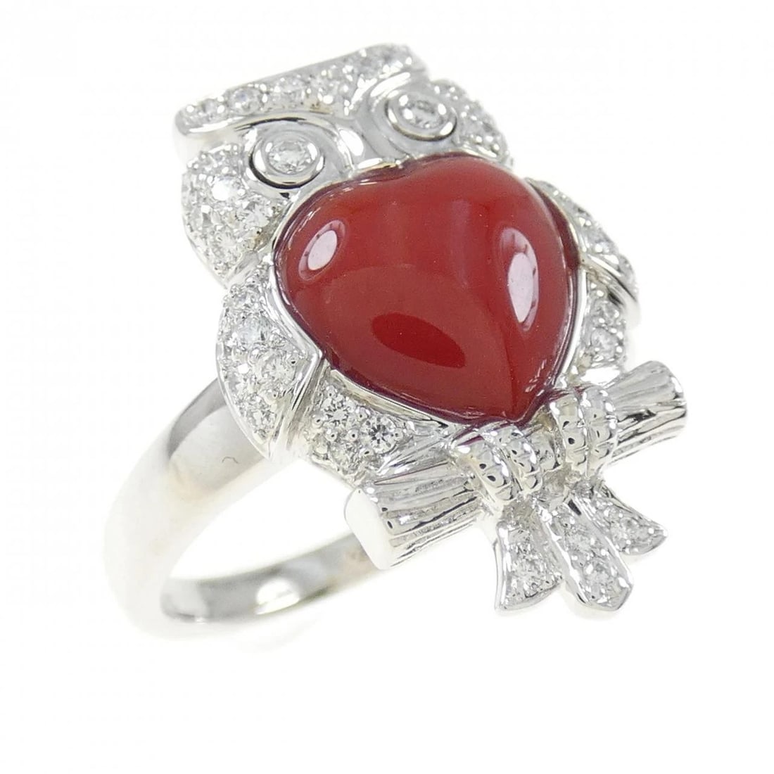 K18WG OWL X HEART CORAL RING: K18WG Owl x Heart Coral Ring Brand: Unbranded Type: Coral Ring Material: K18WG, Main Stone/Creation CORAL Secondary Stone Diamond Color: WHITE GOLD Size: US61/4 Accessories: None Accessories Notice:
