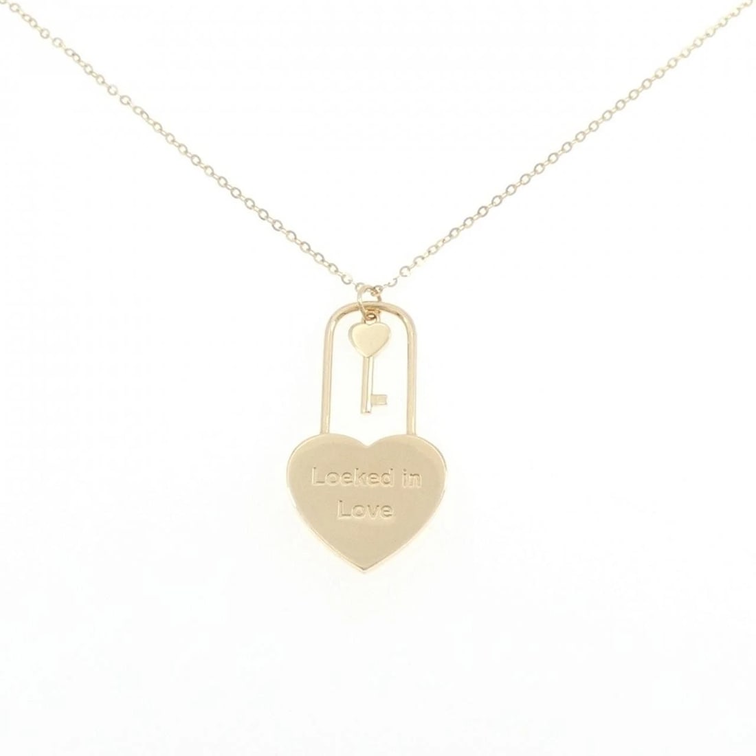 K18YG HEART X KEY NECKLACE: K18YG Heart x Key Necklace Brand: Unbranded Type: Necklace Material: K18YG, Color: Yellow Gold Size: 42-45cmActual Size Pendant length approx. x width approx.: 32.1mmx17.7mm Chain maximum width