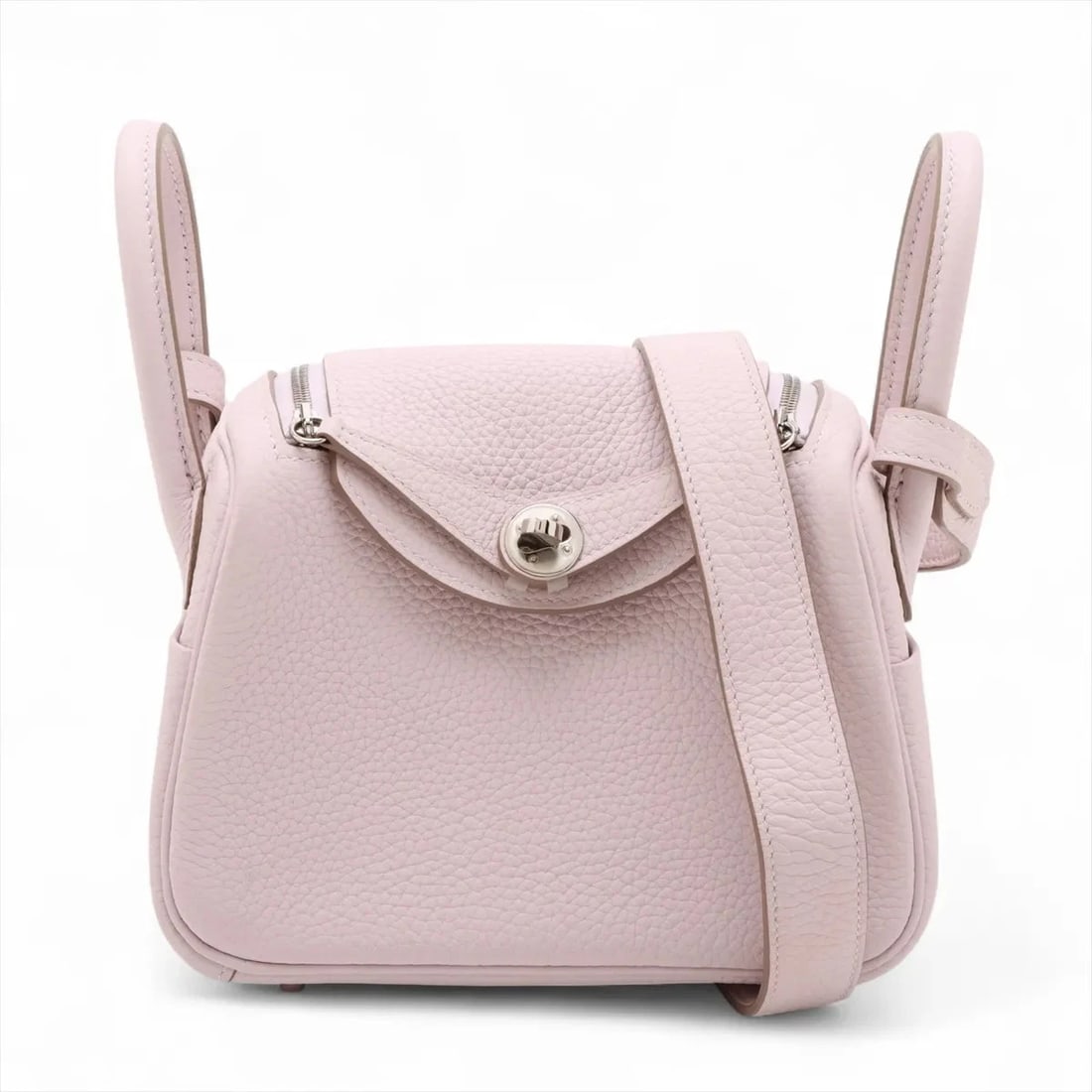 HERMES LINDY MINI 20 VERSO MAUVE PALE X BETON: Hermes Lindy mini 20 Verso Mauve pale x beton Brand: Hermès Type: Shoulder bag Material: Taurillon Clemence Color: Mauve Pale x Beton Size: Height:4.9inch Length:7.1inch Depth:3.5inch Handle height:2