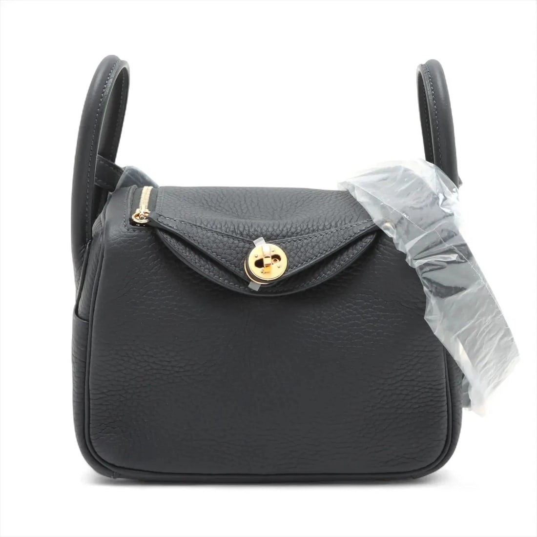 HERMES LINDY MINI 20 TAURILLON CLEMENCE CAVAN: Hermes Lindy mini 20 Taurillon Clemence Cavan Brand: Hermès Type: Shoulder bag Material: Taurillon Clemence Color: Cavan Size: Height:4.7inch Length:7.3inch Depth:3.5inch Handle height:2.8inch Acc