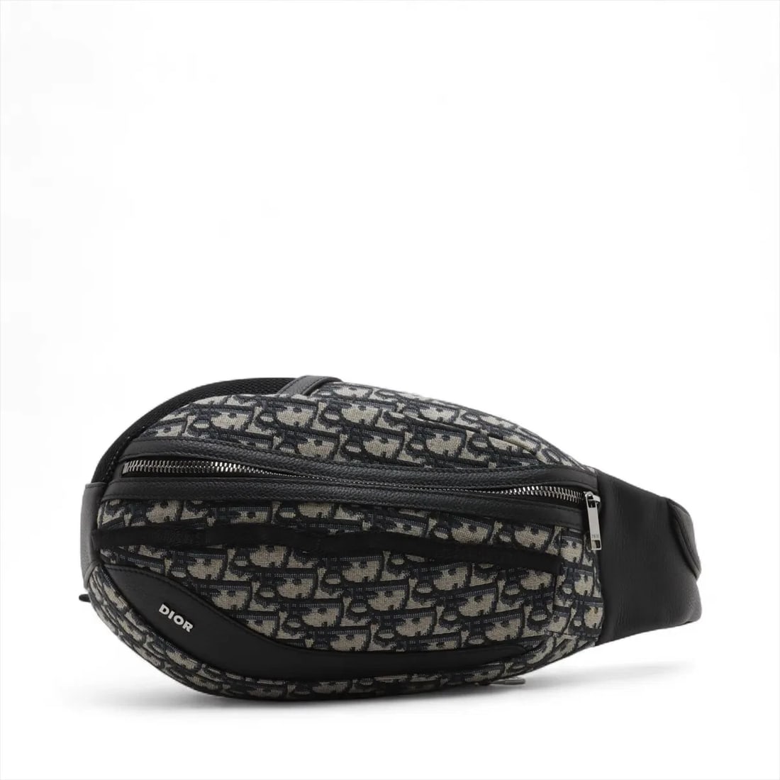 DIOR HOMME OBLIQUE CANVAS X LEATHER SLING BACKPACK: DIOR HOMME Oblique canvas x leather Sling backpack Brand: DIOR HOMME Type: Waist pouch/Body bag Material: canvas Color: Navy Blue Size: Height:12.0inchLength:6.9inchDepth:3.0inch Accessories: None