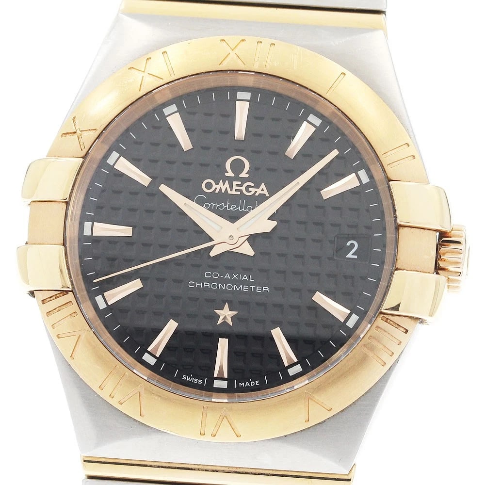OMEGA CONSTELLATION DATE AUTOMATIC: OMEGA Constellation date Automatic Brand: OMEGA Type: Wristwatch Material: Band Material Stainless Steel/PG, Case Material Stainless Steel/PG Color: Band Color Silver / Pink Gold, Dial Colorblack, Cas