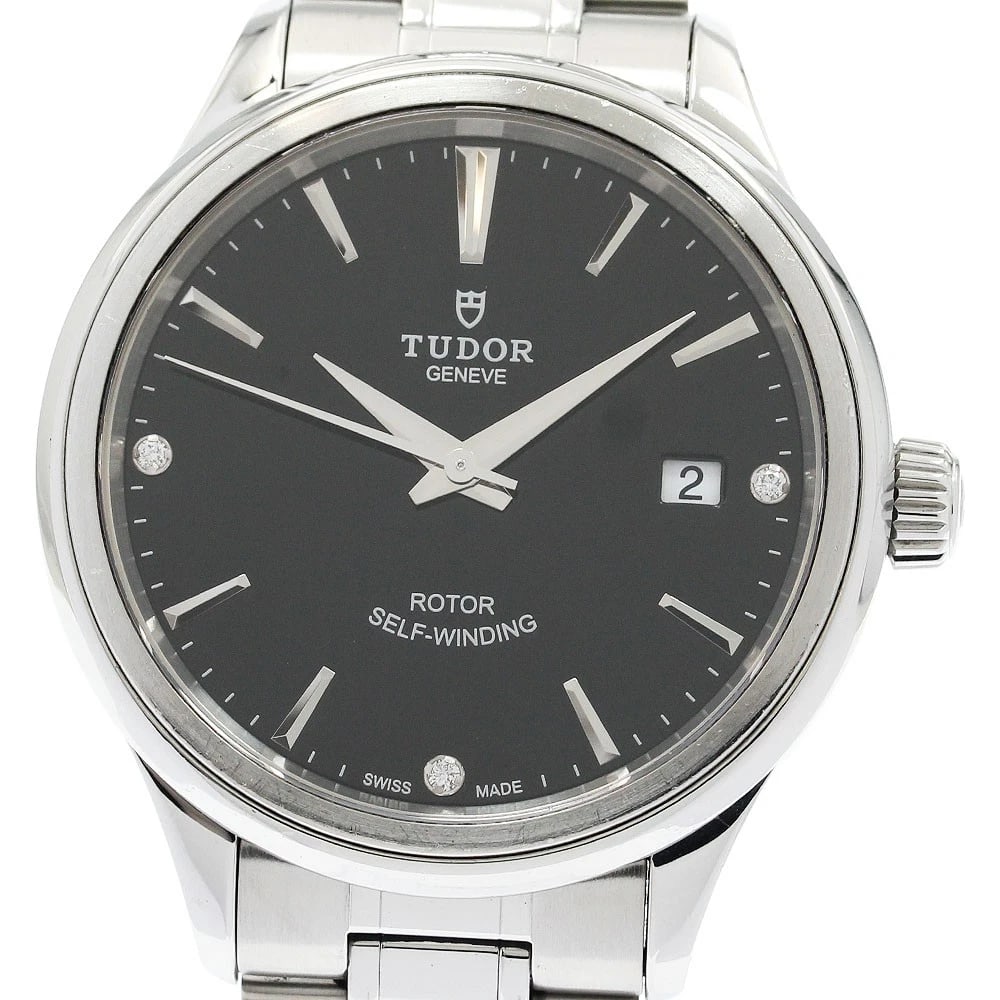 TUDOR STYLE DIAMOND DATE BLACK AUTOMATIC WATCH: TUDOR style diamond date black Automatic Watch Brand: TUDOR Type: Wristwatch Material: Band Material Stainless Steel, Case Material Stainless Steel Color: Band Color Silver, Dial Colorblack, Case Colo