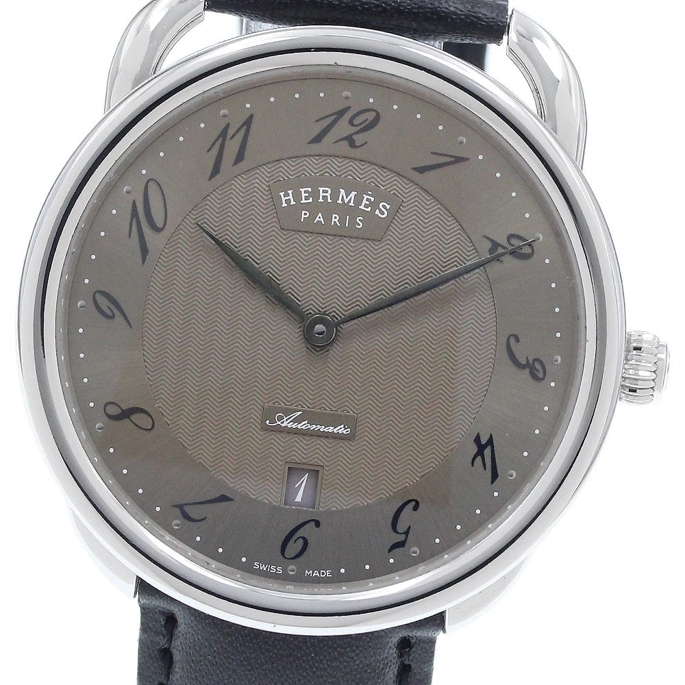 HERMES ARCEAU DATE GRAY AUTOMATIC WATCH: HERMES Arceau Date Gray Automatic Watch Brand: HERMES Type: Wristwatch Material: Band Material leather, Case Material Stainless Steel Color: Band Color black, Dial Colorgray, Case ColorSilver Size: Ca