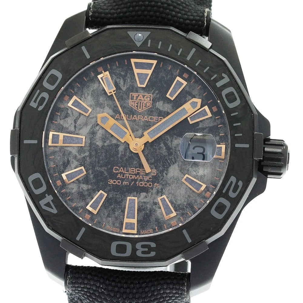 TAG HEUER AQUARACER CALIBER AUTOMATIC: TAG HEUER Aquaracer Caliber Automatic Brand: TAG HEUER Type: Wristwatch Material: Band Material Nylon / leather, Case Material Titanium / carbon Color: Band Color black, Dial ColorBlack carbon, Case