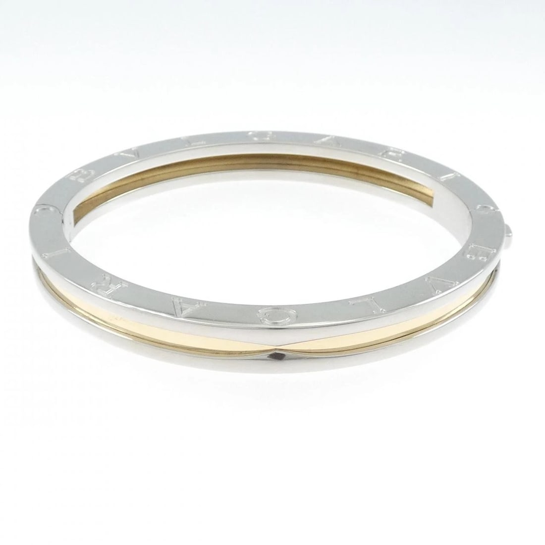 BVLGARI B.ZERO1 BANGLE: Bvlgari B.zero1 Bangle Brand: BVLGARI Type: Bracelet Material: Stainless steel/750 yellow gold, Color: White Size: Size16.5cmActual Size Max width approx: 6.9mm Accessories: None Accessories Notice:
