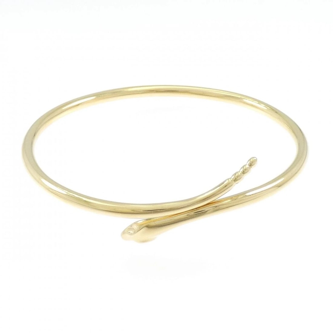 TIFFANY&CO. SNAKE BANGLE: TIFFANY&Co. Snake Bangle Brand: TIFFANY&Co. Type: Bracelet Material: 750 yellow gold, Color: yellow gold Size: 17.5cmActual Size Max width approx: 14.1mm Accessories: None Accessories Noti