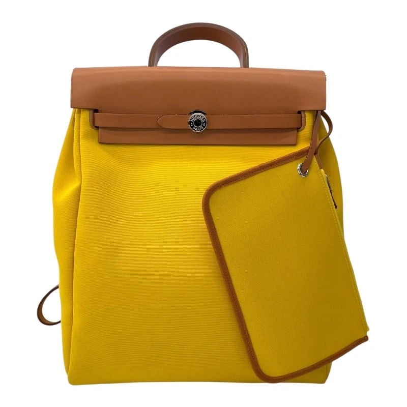 HERMES HERBAG ZIP-ADO PM BACKPACK: HERMES Herbag Zip-Ado PM Backpack Brand: HERMES Type: Backpack Â· Daypack Material: Toile Hunter Color: Lime Natural SVHardware Size: W29cm x H40cmx D10cm W11.4 x H15.7x D3.9inch Accessories: None