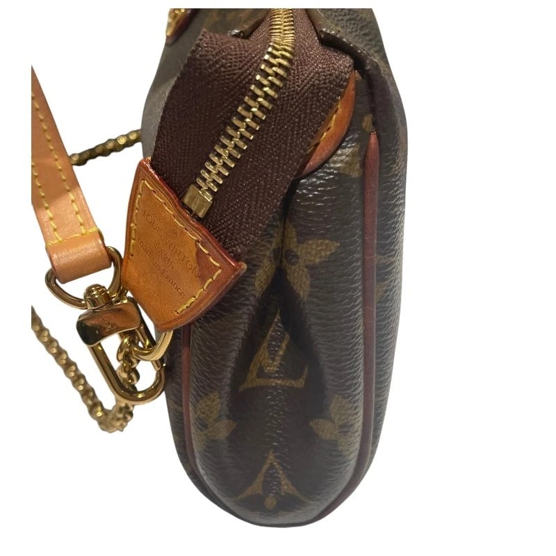 LOUIS VUITTON EVA SHOULDER BAG: LOUIS VUITTON Eva Shoulder Bag Brand: LOUIS VUITTON Type: Shoulder Bag Material: Monogram canvas Color: Brown Size: W22cm x H13cmx D4cm W8.7 x H5.1x D1.6inch Accessories: None Accessories Notice: