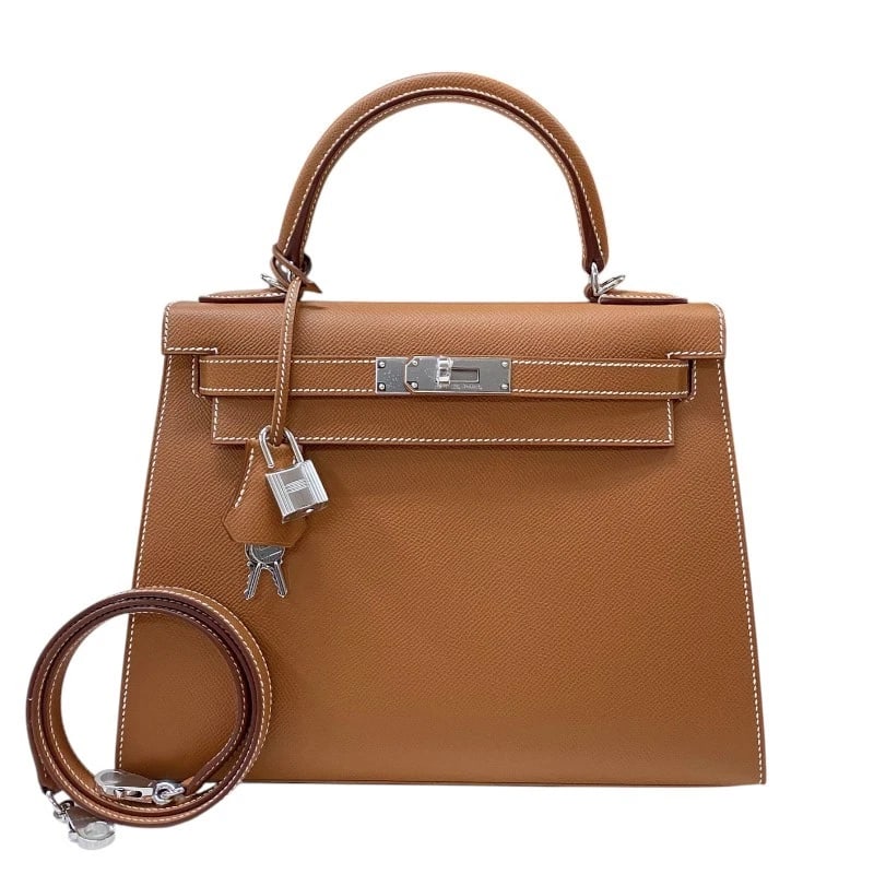 HERMES KELLY 28 HANDBAG: HERMES Kelly 28 Handbag Brand: HERMES Type: Handbag Material: Epsom Color: Gold SilverHardware Size: W29cm x H21cmx D11cm W11.4 x H8.3x D4.3inch Accessories: None Accessories Notice: When
