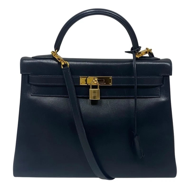 HERMES KELLY 32 INTERNAL SEWING HANDBAG: HERMES Kelly 32 internal sewing Handbag Brand: HERMES Type: Handbag Material: Box scarf Color: Navy Gold Hardware Size: W31cm x H22cmx D11.5cmW12.2 x H8.7x D4.5inch Accessories: None Acces