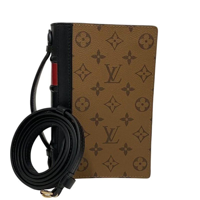 LOUIS VUITTON BOOK WALLET ON CHAIN SHOULDER BAG: LOUIS VUITTON Book Wallet on Chain Shoulder Bag Brand: LOUIS VUITTON Type: Shoulder Bag Material: Monogram reverse canvas Color: Monogram reverse Size: W20cm x H13cmx D3.5cmW7.9 x H5.1x D1.4inch A