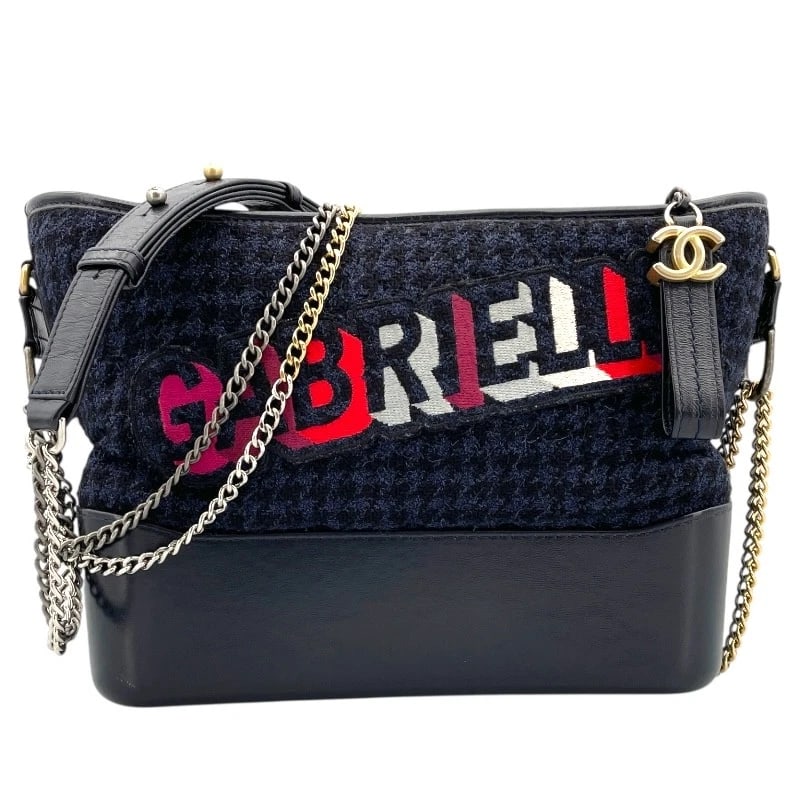 CHANEL GABRIELLE DE CHANEL HOBO MEDIUM SHOULDER BAG: CHANEL Gabrielle de Chanel Hobo Medium Shoulder Bag Brand: CHANEL Type: Shoulder Bag Material: tweed Color: Navy Size: W30cm x H21cmx D7cm W11.8 x H8.3x D2.8inch Accessories: None Accessor
