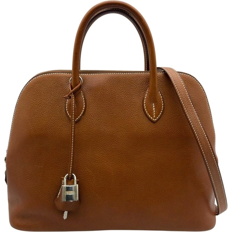 HERMES BORED HANDBAG: HERMES Bored Handbag Brand: HERMES Type: Handbag Material: Evercolor Color: Gold SilverHardware Size: W30cm x H23cmx D12cmW11.8 x H9.1x D4.7inch Accessories: None Accessories Notice: When