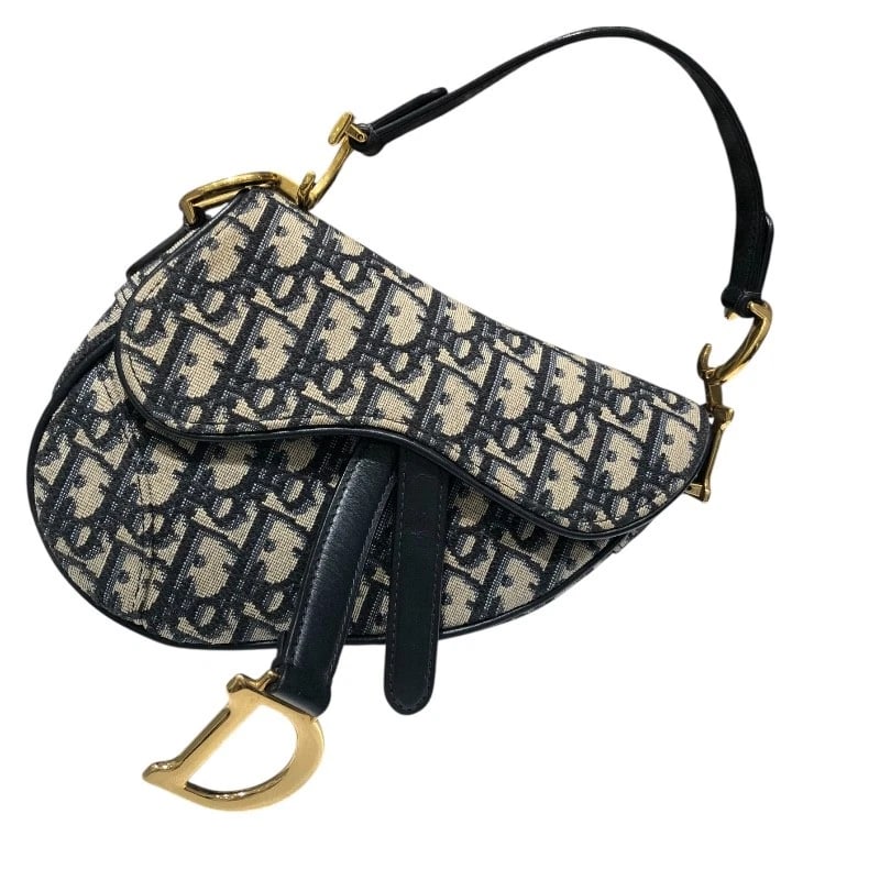 CHRISTIAN DIOR SADDLEBAG MINI HANDBAG: Christian Dior saddlebag mini Handbag Brand: Christian Dior Type: Handbag Material: Jacquard Color: Navy Size: W20cm x H15cmx D4cm W7.9 x H5.9x D1.6inch Accessories: None Accessories Notic