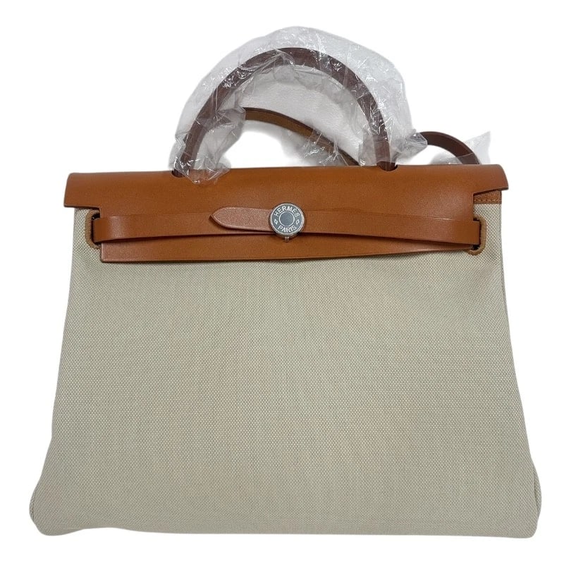 HERMES HERBAG ZIP PM SHOULDER BAG: HERMES Herbag Zip PM Shoulder Bag Brand: HERMES Type: Shoulder Bag Material: Toile Hunter Color: Beige/Natural Size: W30cm x H25cmx D10cm W11.8 x H9.8x D3.9inch Accessories: None Accessori