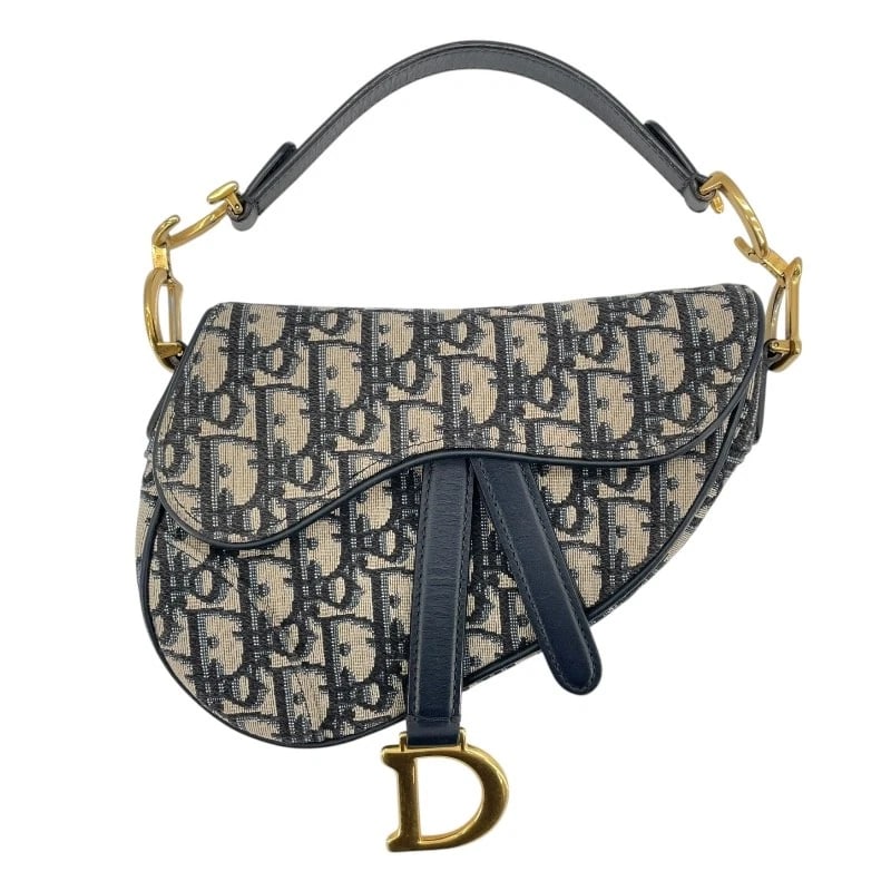 CHRISTIAN DIOR SADDLEBAG MINI HANDBAG: Christian Dior saddlebag mini Handbag Brand: Christian Dior Type: Handbag Material: Jacquard Color: Navy GDHardware Size: W18cm x H13cmx D5cm W7.1 x H5.1x D2.0inch Accessories: None Access