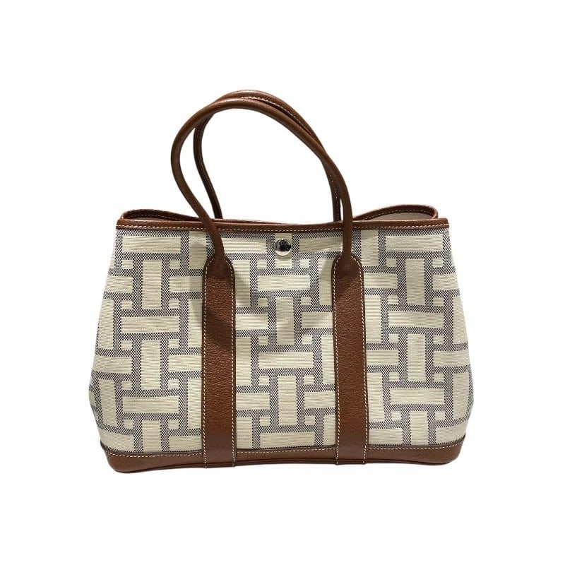 HERMES GARDEN PARTY HANDBAG: HERMES Garden party Handbag Brand: HERMES Type: Handbag Material: Toile Mosaic Color: Ivory Size: W29cm x H20cmx D13cm W11.4 x H7.9x D5.1inch Accessories: None Accessories Notice: When pur