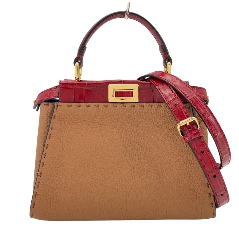 FENDI MINI PEEK-A-BOO CELERIA HANDBAG: FENDI Mini Peek-A-Boo Celeria Handbag Brand: FENDI Type: Handbag Material: leather Color: Brown Size: W23cm x H17cmx D10cm W9.1 x H6.7x D3.9inch Accessories: None Accessories Notice: When