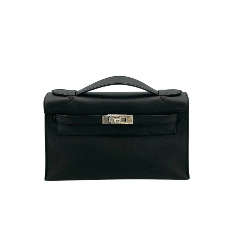 HERMES POCHETTE KELLY HANDBAG: HERMES Pochette Kelly Handbag Brand: HERMES Type: Handbag Material: Swift Color: Black SilverHardware Size: W22cm x H13cmx D6cmW8.7 x H5.1x D2.4inch Accessories: None Accessories Notice: W