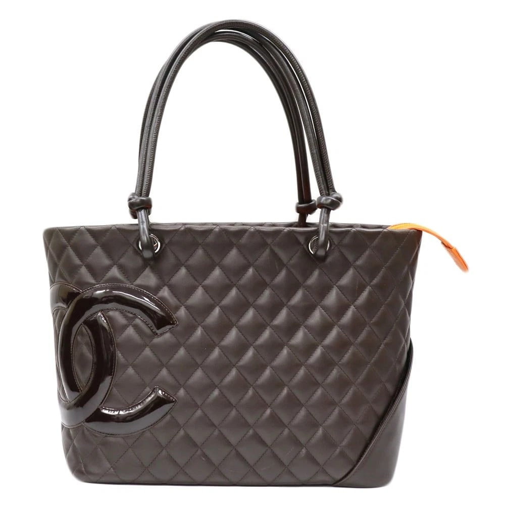 CHANEL CAMBON LARGE TOTE DARK BROWN DUST BAG: Chanel Cambon Large Tote Dark Brown Dust Bag Brand: CHANEL Type: Handbag Material: lambskin Color: Dark brown orange Size: W37cm x H29.5cm x D14.5cm Accessories: None Accessories Notice: W