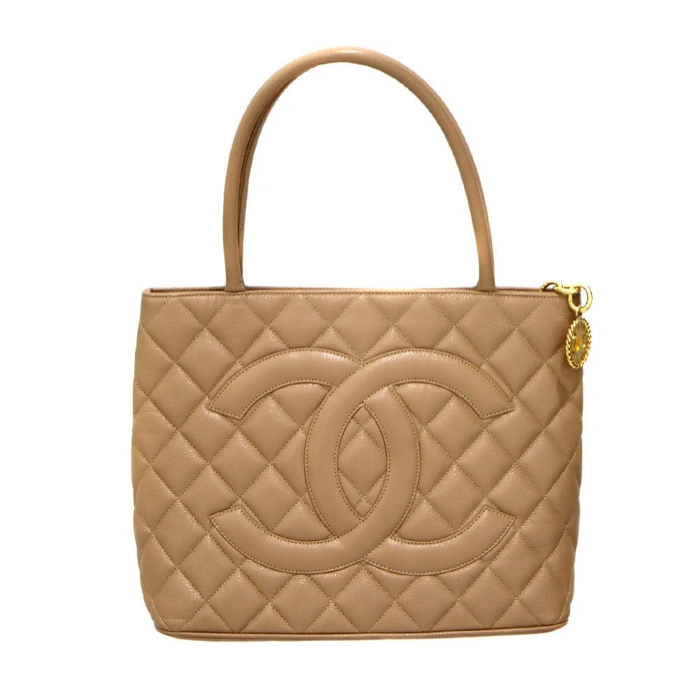 CHANEL REISSUE TOTE BAG CAVIAR LEATHER BEIGE WITH DUST BAG: Chanel Reissue Tote Bag Caviar Leather Beige with Dust Bag Brand: CHANEL Type: Handbag Material: Caviar skin/leather Color: Beige with gold hardware Size: W30cm x H24.5cm x D14.5cm Accessories: No